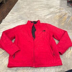 The North Face red thin puffer jacket size L perfect beater for work has stains